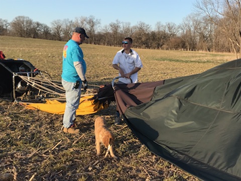 Crew packing the balloon after landing