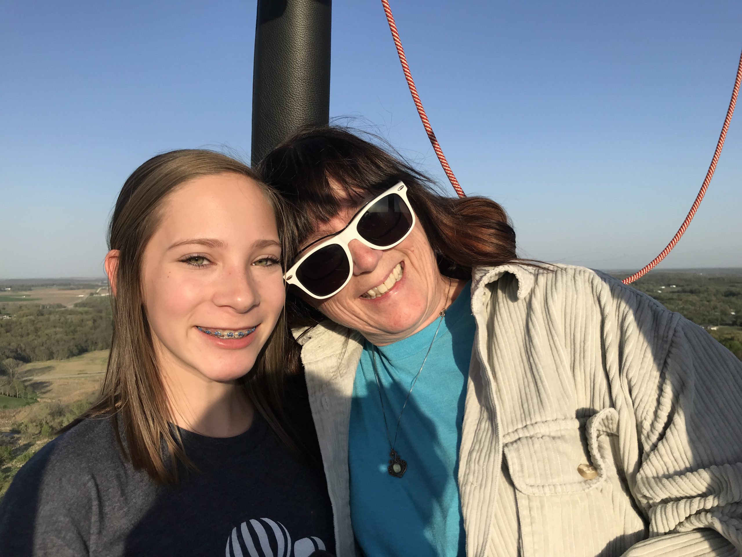 Lisa and Julie riding in the balloon basket