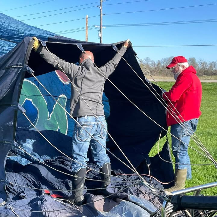 Meg and her softball team showed up this morning to help with the balloon.